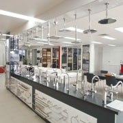 shop floor showing range of taps and showerheads interior design, gray