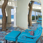 This home was designed by Geoffrey Bradfield. Here blue, furniture, interior design, leisure, swimming pool, table, gray, teal