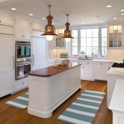 Here is a view of a kitchen that cabinetry, countertop, cuisine classique, floor, flooring, hardwood, home, interior design, kitchen, real estate, room, wood flooring, gray