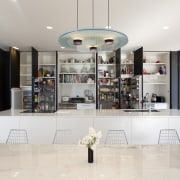 Now you see it, now you dont. Dark interior design, kitchen, white
