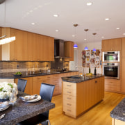 Seen here is a kitchen designed by Roberta countertop, cuisine classique, interior design, kitchen, real estate, room, gray, orange