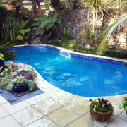 Outdoor view of Pool with native surroundings. - backyard, landscaping, leisure, majorelle blue, property, resort, swimming pool, water, water feature, yard