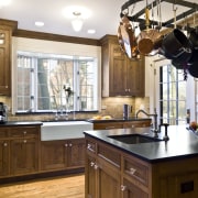 Seen here is the kitchen of the home cabinetry, countertop, cuisine classique, interior design, kitchen, room, brown, white