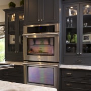 This kitchen was designed by Susan Brunstrum, Sweet cabinetry, countertop, cuisine classique, furniture, home appliance, kitchen, kitchen appliance, major appliance, oven, black