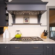 This kitchen was designed by Susan Brunstrum, Sweet cabinetry, countertop, cuisine classique, home appliance, interior design, kitchen, kitchen appliance, kitchen stove, room, black, white