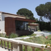 This side view of a master bedroom wing, cottage, estate, home, house, property, real estate, villa