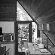 Detail image of the original kitchen in a architecture, black and white, daylighting, home, house, interior design, monochrome, monochrome photography, window, black, gray