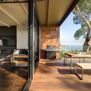 Outdoor deck area. With BBQ and table. - architecture, floor, flooring, hardwood, house, interior design, real estate, wood, brown