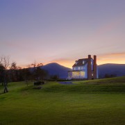 This home was built by Tom Glass of atmosphere, cloud, dawn, dusk, estate, evening, farm, field, grass, grassland, highland, hill, home, horizon, house, landscape, loch, meadow, morning, nature, plant, real estate, rural area, sky, sunlight, sunrise, sunset, tree, brown