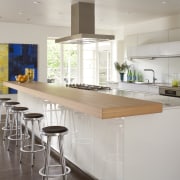 The interiors of this Mid-century Modern house has countertop, cuisine classique, interior design, kitchen, real estate, room, gray