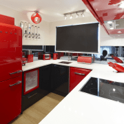 Kitchen view, including fridge. - Kitchen view, including interior design, red, white, red