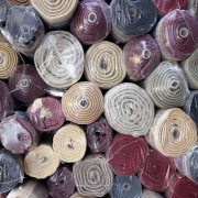 Rolls of carpets/Rugs. - Rolls of carpets/Rugs. - pink, purple, textile, thread, gray