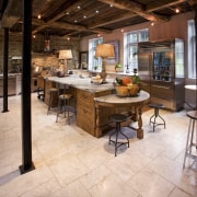 Seen here is a kitchen designed by Jill floor, flooring, furniture, hardwood, interior design, table, wood, wood flooring, orange, brown