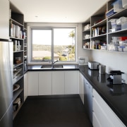 Seen here is a kitchen designed by Wonderful cabinetry, countertop, interior design, kitchen, white, black