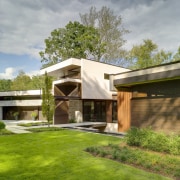 FExtended eaves create interesting plays of light and architecture, backyard, cottage, elevation, estate, facade, farmhouse, grass, home, house, landscape, property, real estate, residential area, roof, yard, brown, gray