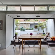 Pocket sliders in this kitchen draw back to ceiling, house, interior design, living room, real estate, window, gray