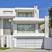This home was designed and built by Starr architecture, building, door, elevation, facade, home, house, official residence, property, real estate, residential area, window, white, gray