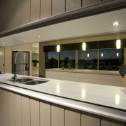 This home was designed and built by Graeme countertop, interior design, kitchen, real estate, window, black, brown, gray