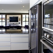 This home won the Registered Master Builders House countertop, interior design, kitchen, gray, black, white