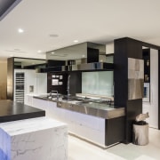 A dropped ceiling helps to define the kitchen countertop, interior design, kitchen, gray