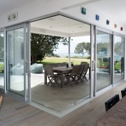 Seen here is joinery designed by Able Aluminium, door, floor, house, interior design, real estate, window, gray