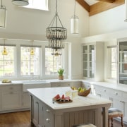 View of the kitchen area.  The cabinets cabinetry, ceiling, countertop, cuisine classique, daylighting, dining room, interior design, kitchen, room, table, window, gray, white