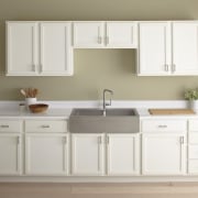 Seen here is a kitchen with a Kohler bathroom, bathroom accessory, bathroom cabinet, bathroom sink, cabinetry, chest of drawers, countertop, cuisine classique, drawer, floor, furniture, hardwood, kitchen, plumbing fixture, product, product design, room, sink, tap, gray