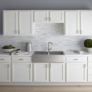 Seen here is a kitchen with a Kohler bathroom accessory, bathroom cabinet, cabinetry, chest of drawers, countertop, cuisine classique, drawer, furniture, kitchen, product design, room, sink, tap, gray