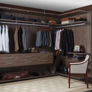 Seen here is a storage system/closet designed and closet, furniture, room, wardrobe, black, gray