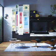 Seen here is a storage system/closet designed and desk, furniture, interior design, living room, shelf, shelving, table, black