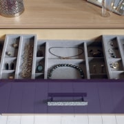 Seen here is a storage system/closet designed and drawer, furniture, interior design, purple, table, purple