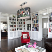 A view of kitchen cabinetry by Cabinetmakers. - bookcase, furniture, home, interior design, living room, room, shelf, shelving, gray, white