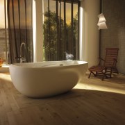 BainUltra ThermaSens therapeutic bath features the Warm Touch bathroom, bathtub, floor, flooring, hardwood, interior design, laminate flooring, plumbing fixture, room, tile, wood, wood flooring, brown