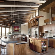 A view of a home designed by Tim ceiling, countertop, cuisine classique, hardwood, interior design, kitchen, loft, real estate, wood, brown, gray