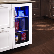 Wine refrigerator from the True Professional Series, a cabinetry, countertop, floor, flooring, hardwood, home appliance, kitchen, kitchen appliance, major appliance, product, refrigerator, red, white