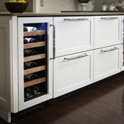 Wine refrigerator from the True Professional Series, a cabinetry, countertop, furniture, home appliance, kitchen, kitchen appliance, major appliance, refrigerator, room, black, white