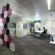 Small meeting areas are dotted throughout the interior architecture, ceiling, flooring, interior design, lobby, gray, black