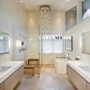 Large remodelled bathroomLarge remodelled bathroom.  Cantilevered vanities bathroom, ceiling, daylighting, estate, floor, flooring, home, interior design, real estate, room, sink, tile, wood flooring, gray