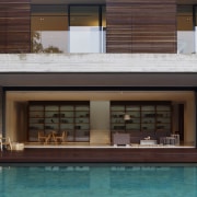 This low-lying, high-end house is by Ong Singapore architecture, facade, home, house, real estate, swimming pool, window, wood, red