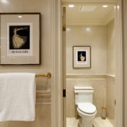 A large mirror doubles the apparent size of bathroom, bathroom accessory, floor, home, interior design, plumbing fixture, room, sink, toilet, wall, orange, brown