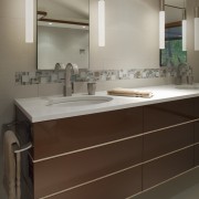 cabinetry in this remodeled bathroom  is done bathroom, bathroom accessory, bathroom cabinet, cabinetry, countertop, interior design, kitchen, room, sink, gray, brown