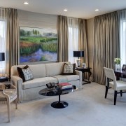 This master bedroom features a sitting area and ceiling, interior design, living room, real estate, room, suite, window treatment, gray