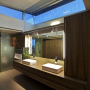 The translucent acrylic doors allow natural light to architecture, ceiling, house, interior design, lighting, brown, black