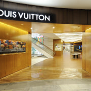 Louis Vuitton Island Maison, Singapore - Louis Vuitton interior design, lobby, orange, brown
