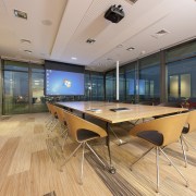 The first office block with a Green Star ceiling, conference hall, floor, flooring, interior design, office, real estate, table, orange, gray