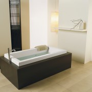 bathroom with Modern luxurious spa-like bath. - bathroom bathroom, bathtub, bed frame, floor, flooring, interior design, plumbing fixture, product design, room, tile, white