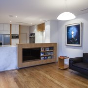 New kitchen cabinetry in this remodelled cottage features floor, flooring, hardwood, interior design, laminate flooring, living room, real estate, room, wood, wood flooring, gray