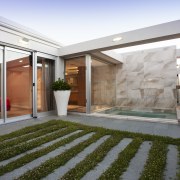 The plunge pool is a new addition to architecture, courtyard, estate, home, house, interior design, property, real estate, window, gray, brown, white