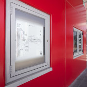 Protech Designs fire protection for Silverdale Centre wall, window, red, gray