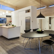 Lockwood show home Tauranga - White lacquered cabinetry architecture, ceiling, floor, flooring, furniture, interior design, kitchen, table, wood flooring, gray